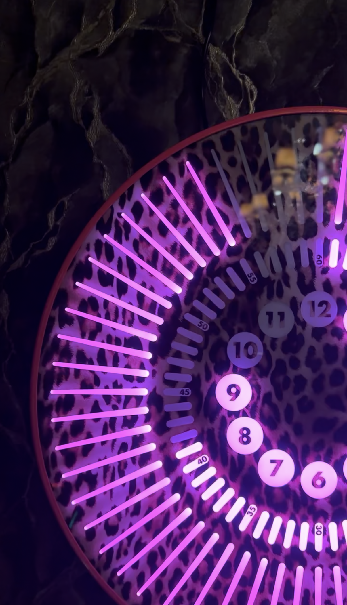 Close up shot of Tempus Leopard Clock with Pink lights at Spearmint Rhino Windmill, Soho, London