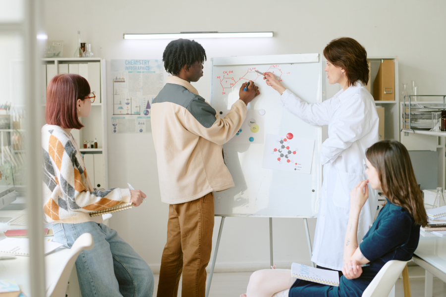 Simple workflow diagram on whiteboard