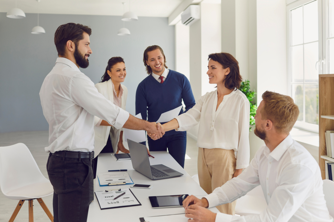 Business owner having a confident meeting with a client