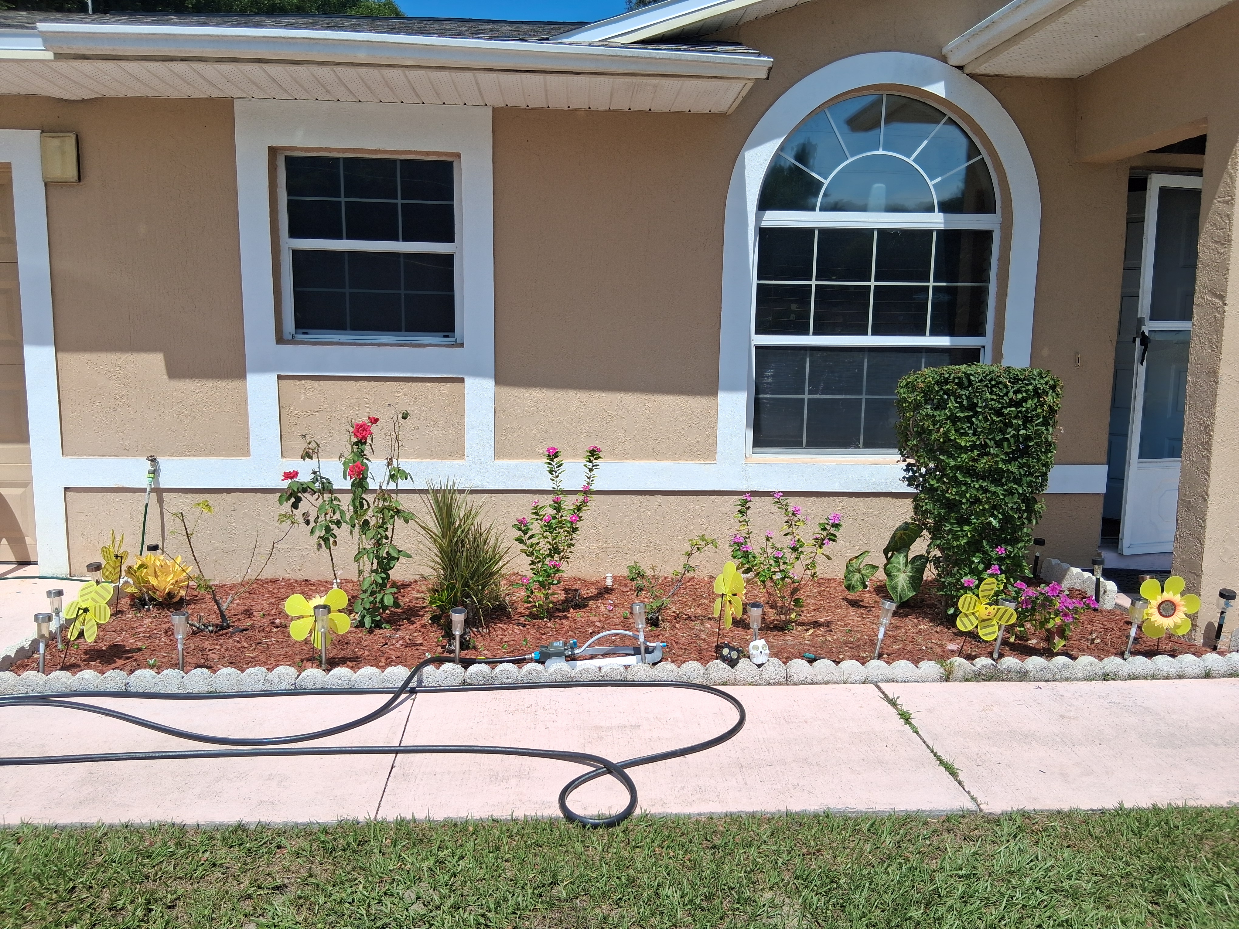 Fresh mulch installation in a garden bed