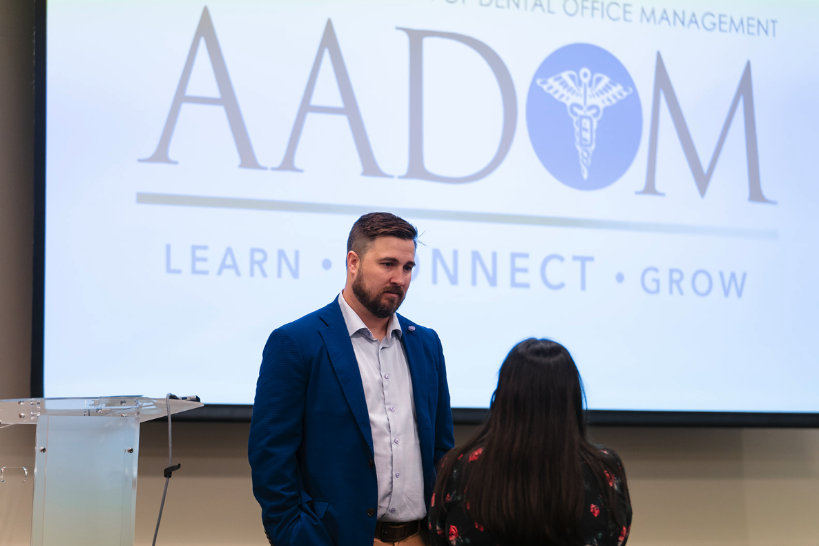 Two people in conversation at an event