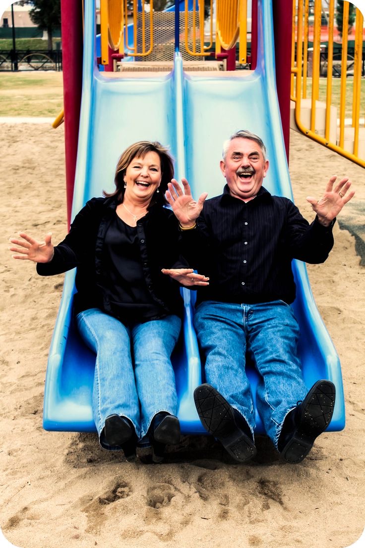 family smiling at the park