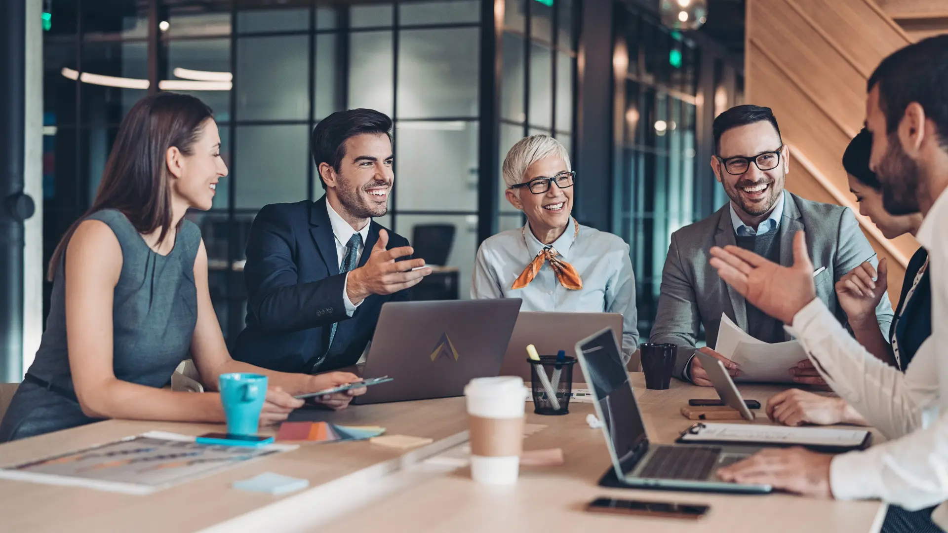 Professional business team in modern office environment — representing ACG's strategic marketing advisory and clinic growth consulting