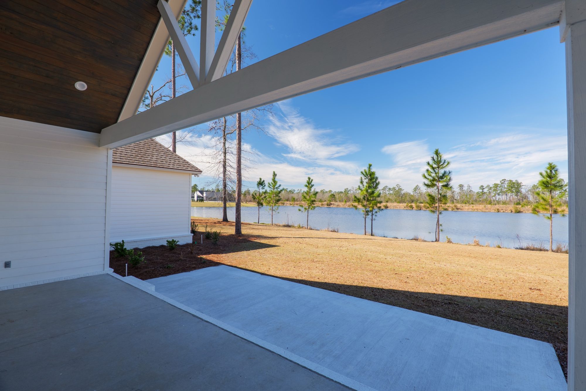 Covered back porch looking out to the lake