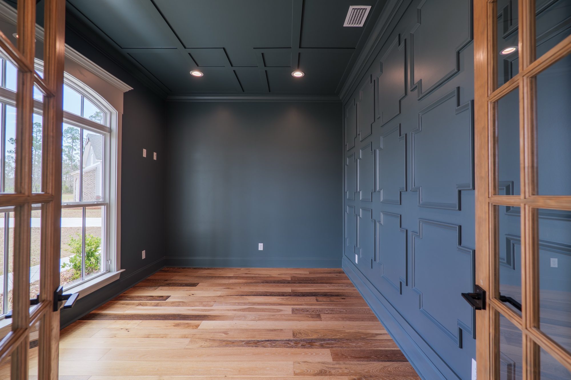 Paneled dark green home office