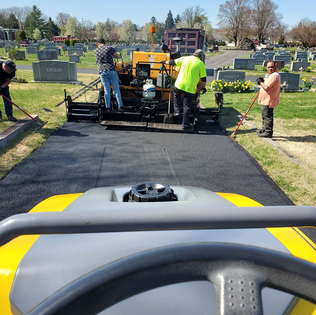 H&S Paving crew operating an asphalt paver to lay a new roadway