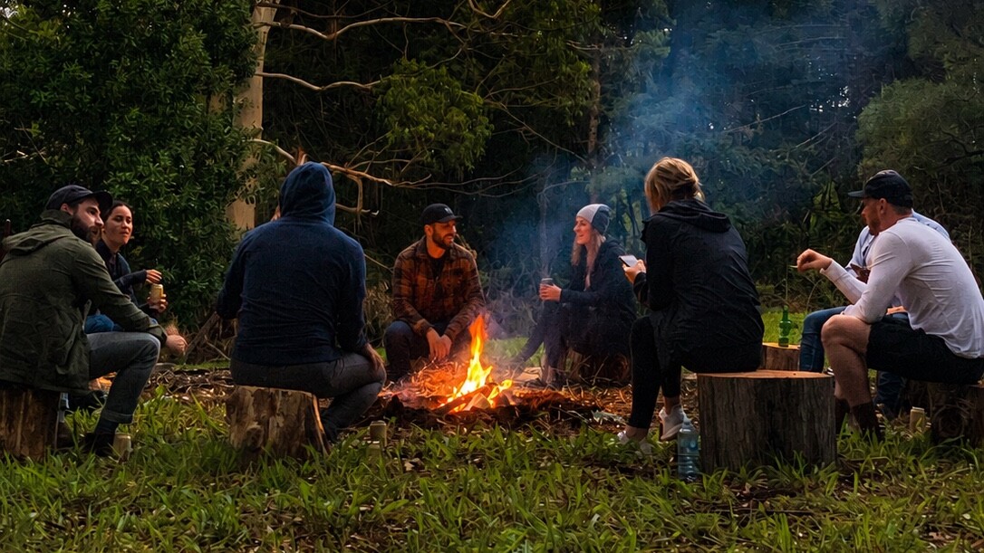 Guests gathered around the bonfire at The Ridge