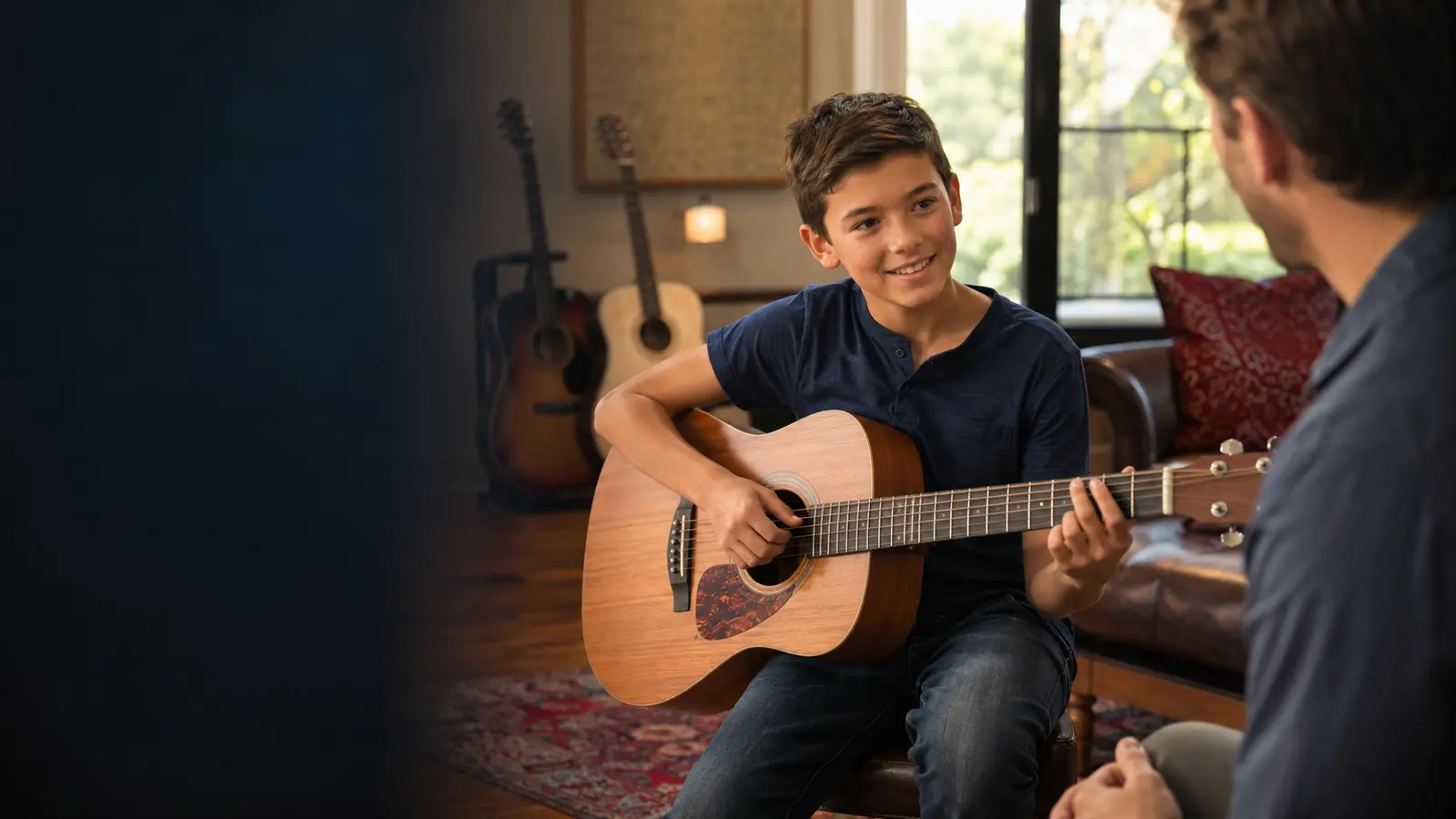 Child enjoying a private guitar lesson in San Antonio