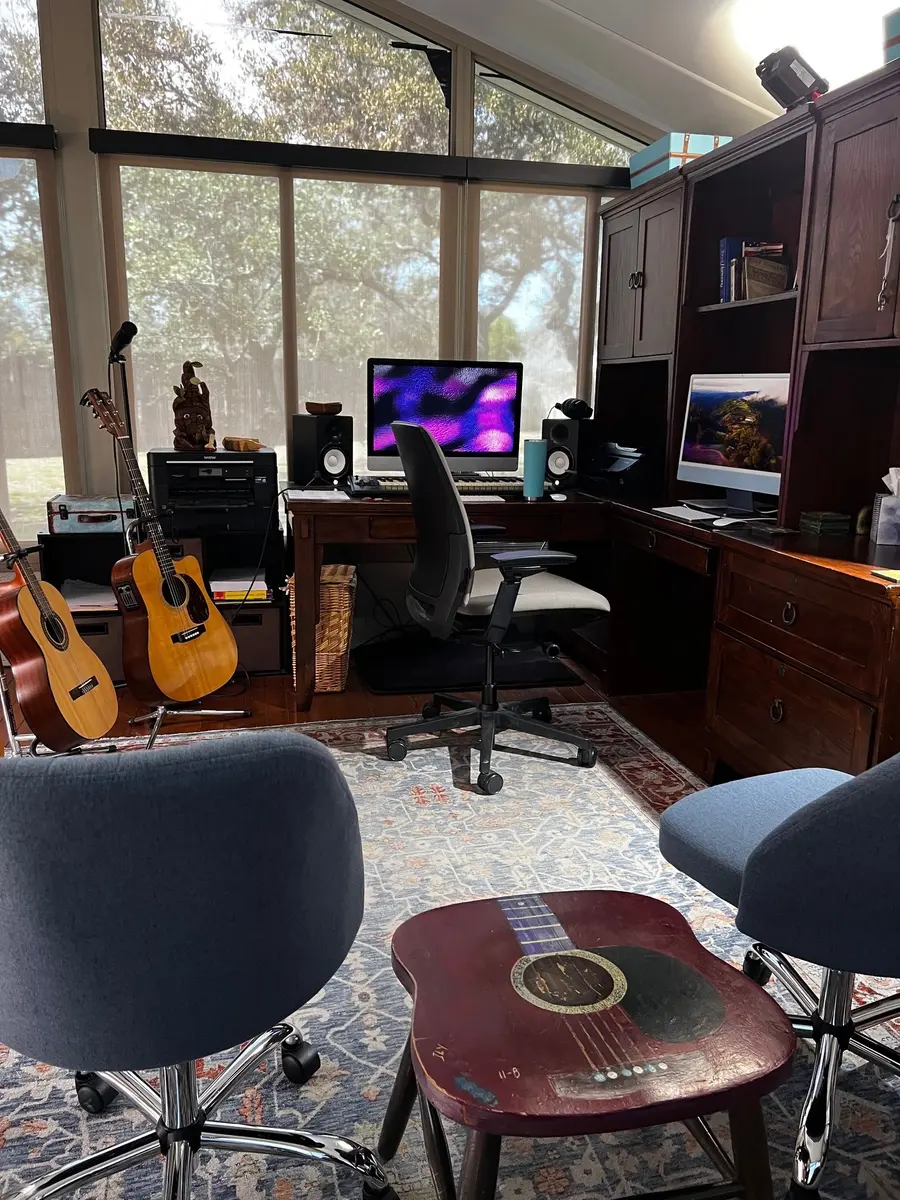 Recording desk and instruments in the Guitar School of Texas studio