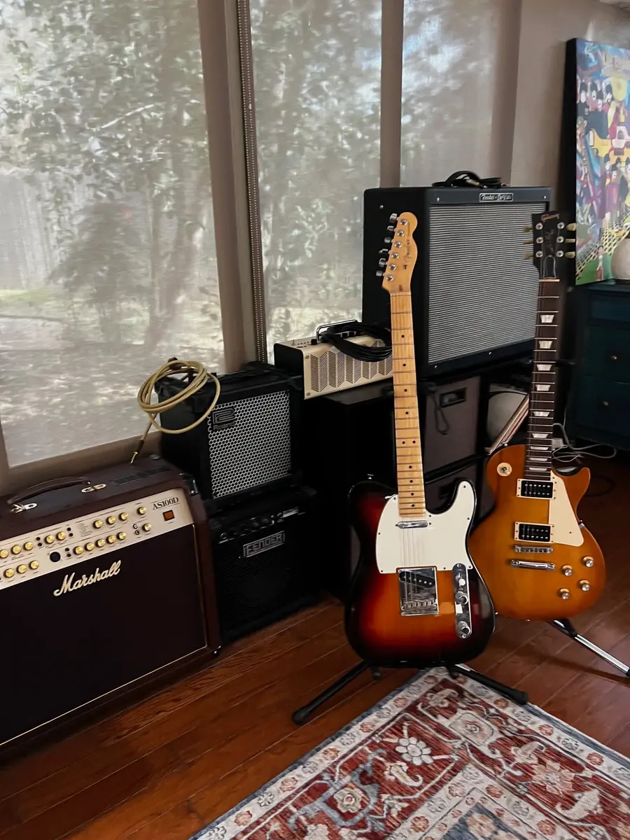 Guitars and amplifiers inside the Guitar School of Texas studio