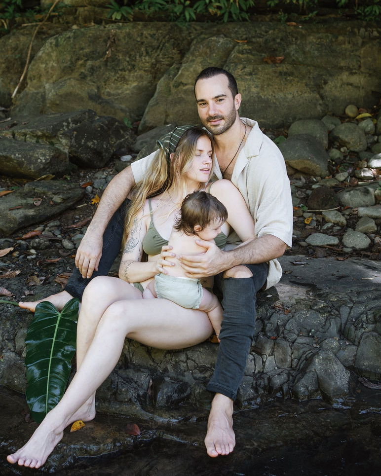 Luke Monteleone with his partner and child