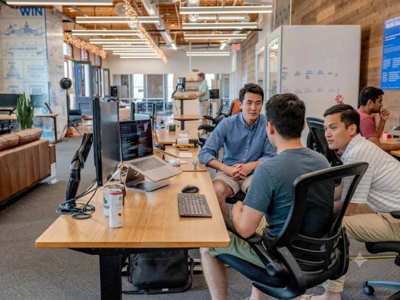 Business leaders discussing a hiring decision