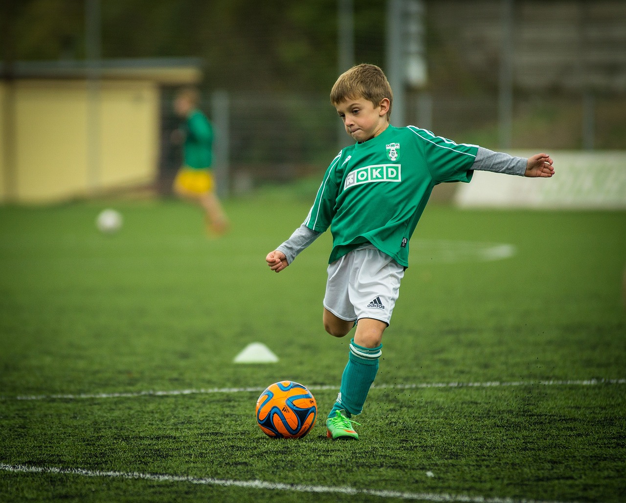 Kids playing football