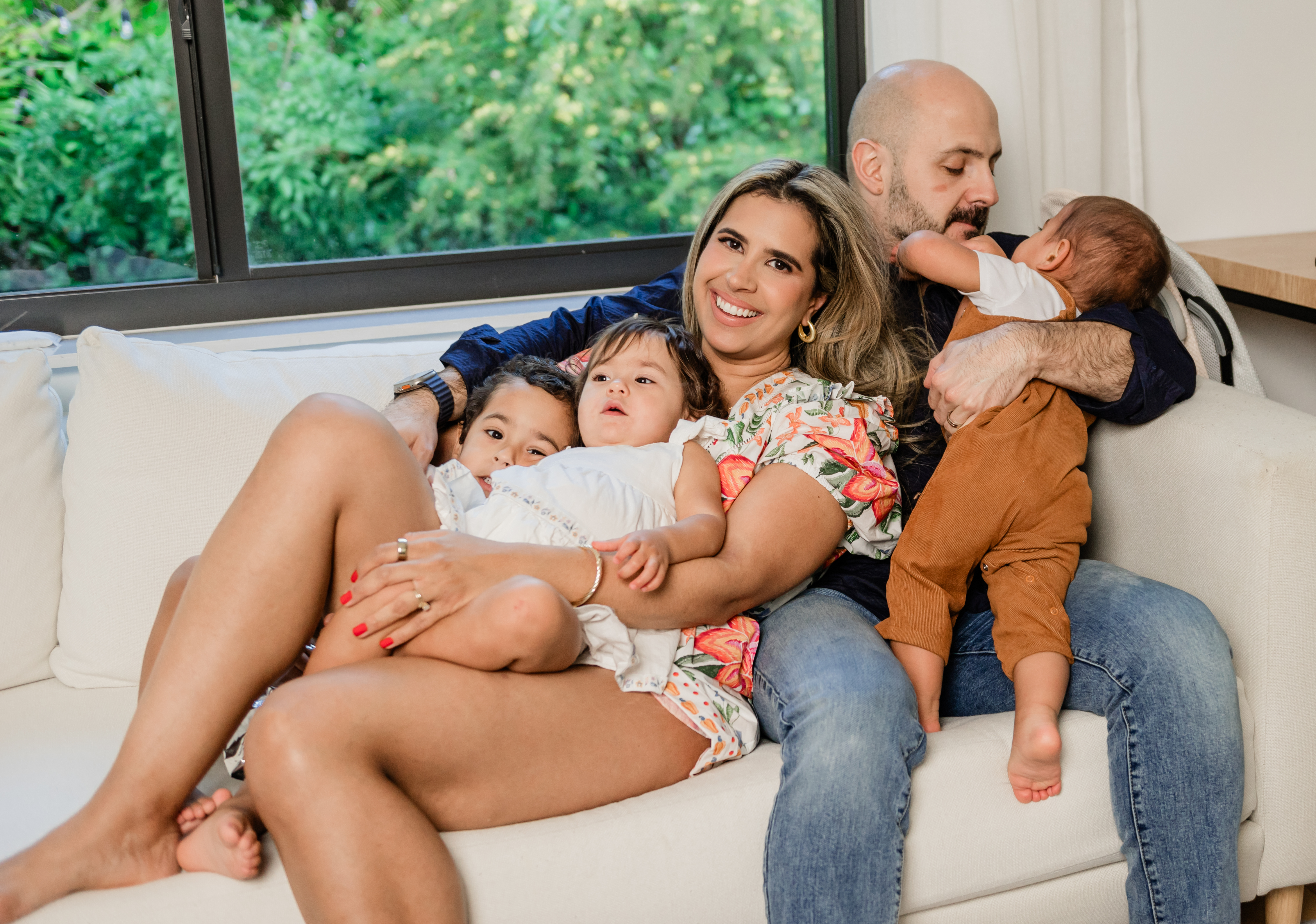 persons hand with red nail polish