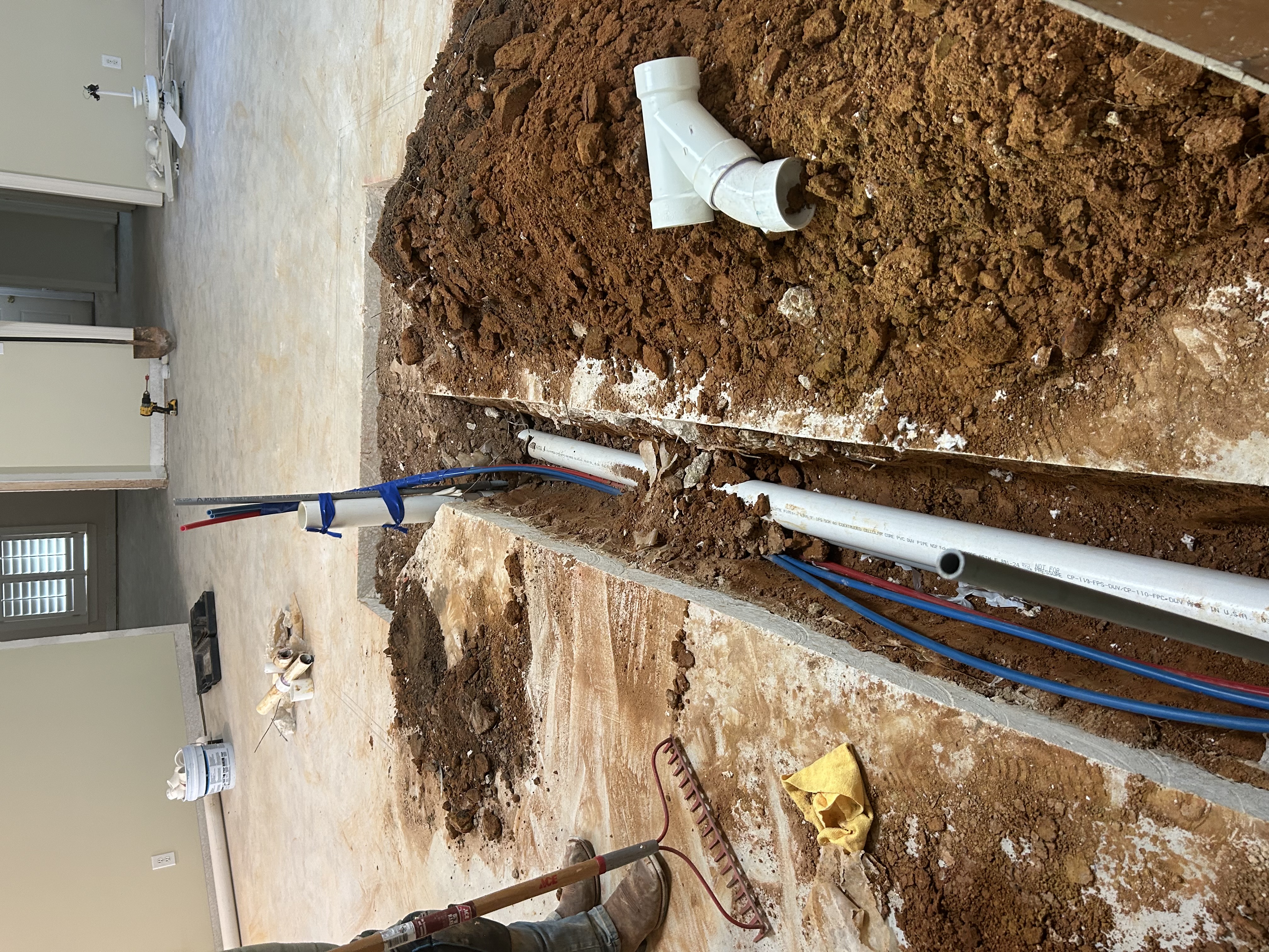 Water line installation project with PVC pipes and copper tubing in Mobile, Alabama.