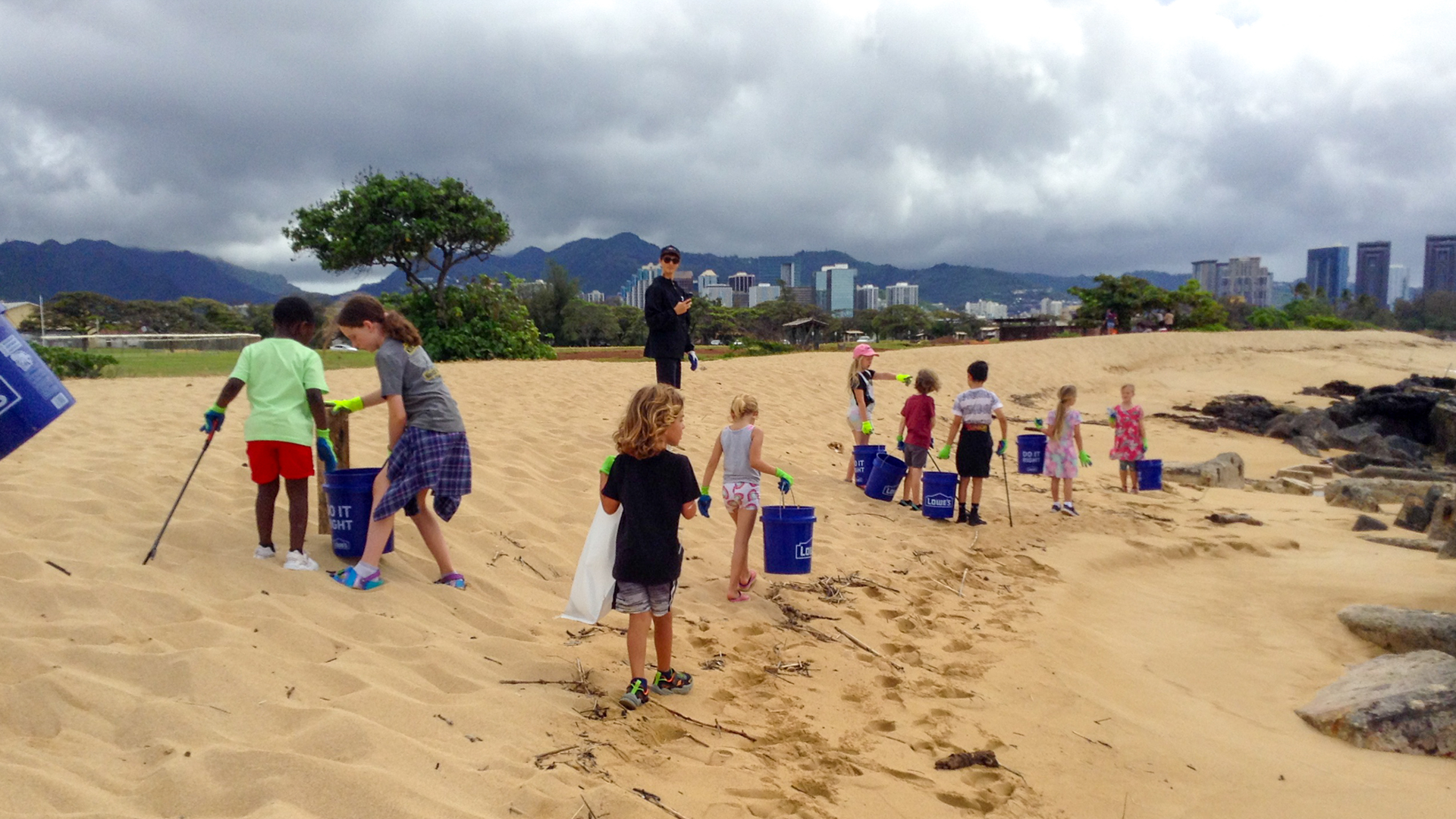 Our education team at an environmental beach cleanup