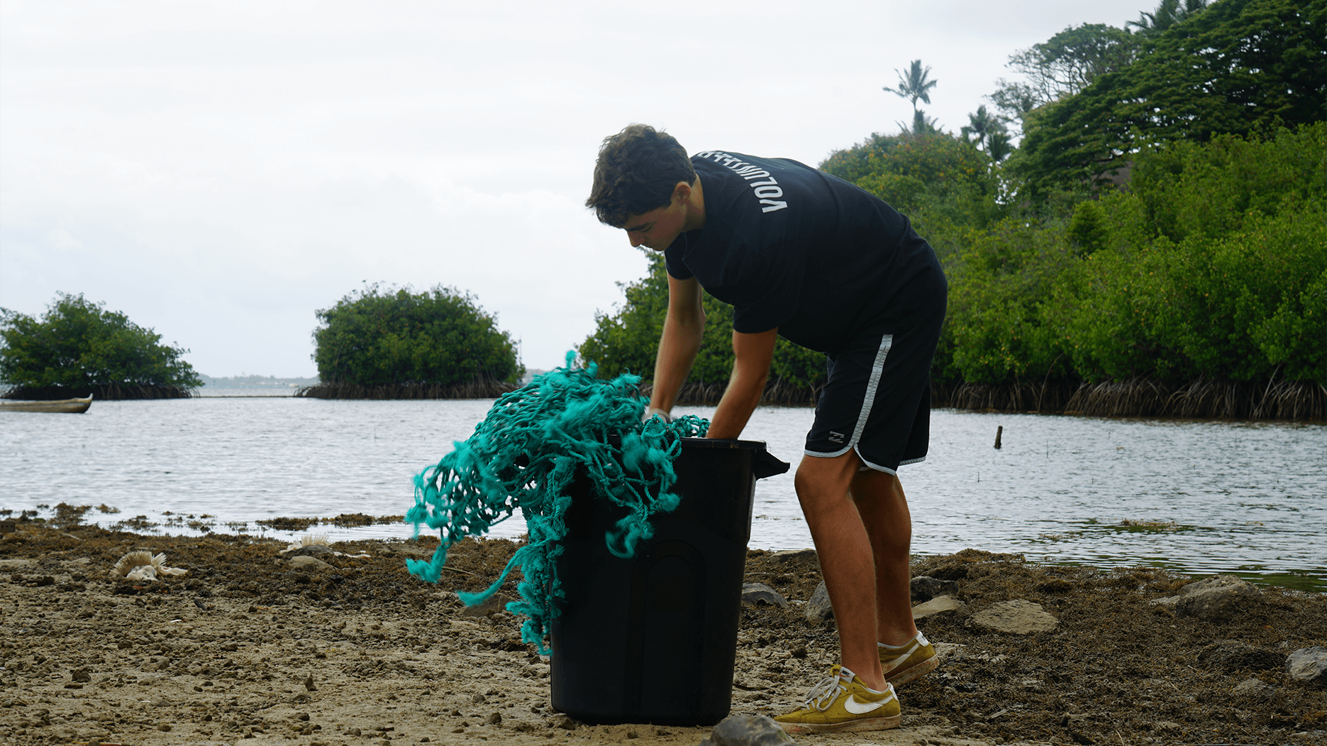 Our cleanup team removing derelict fishing gear from a remote coastline on Oahu, Hawaii