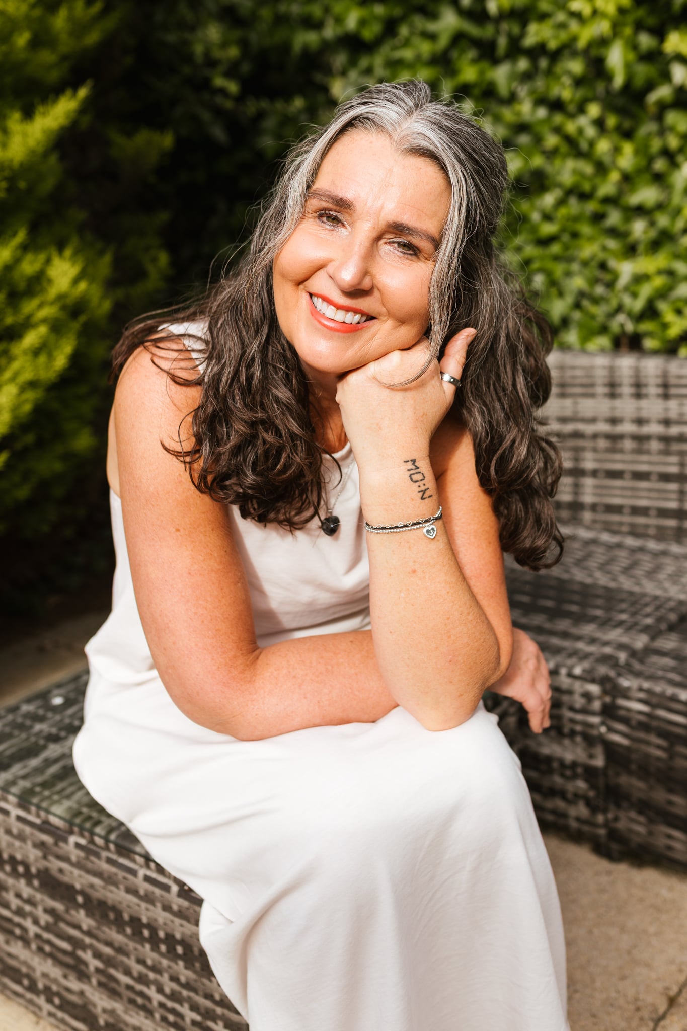 Amy McAuley sitting outdoors