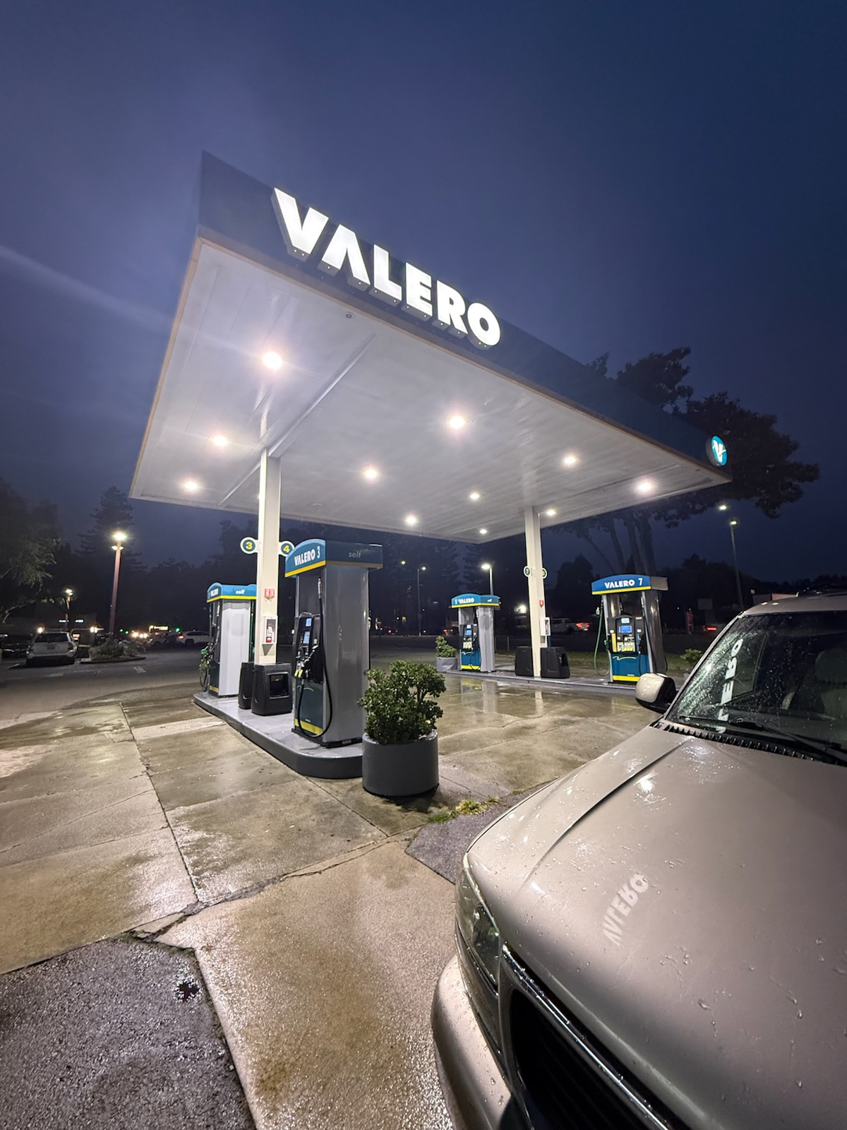 After-hours gas station exterior cleaning with stormwater compliance