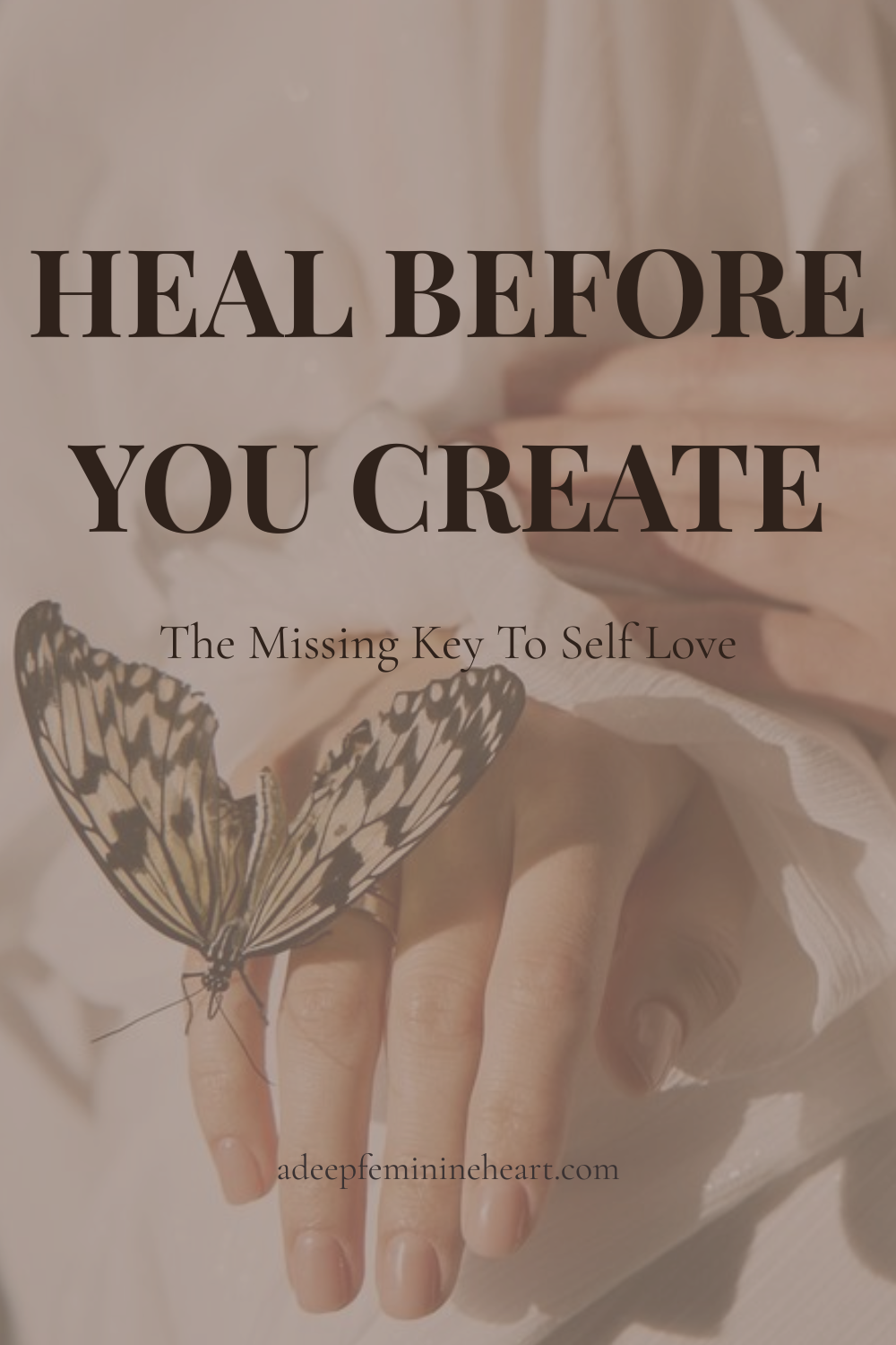 Emotional healing and self love reminder with the words “Heal Before You Create” over a soft feminine image of hands holding a flower and butterfly