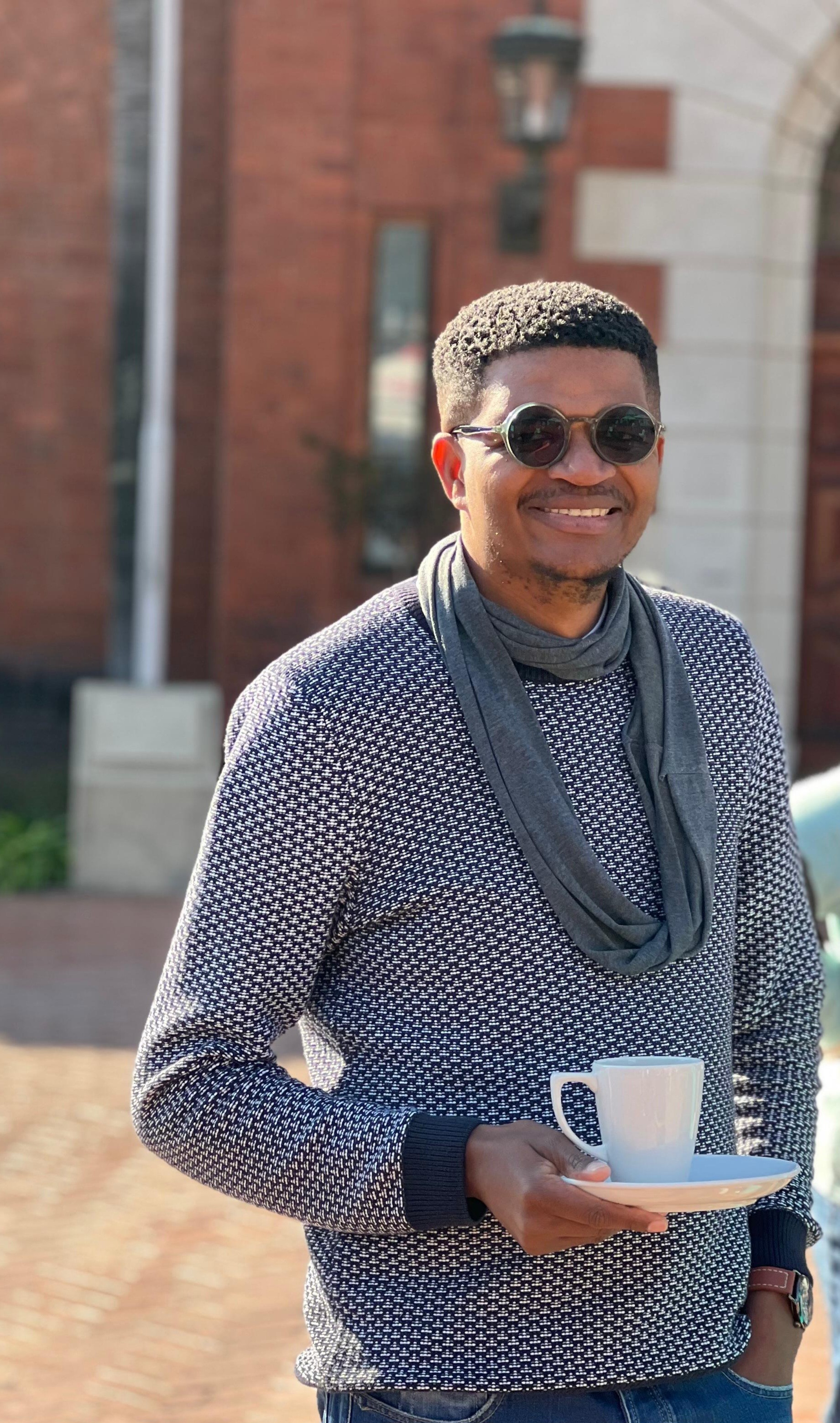 Thabo Moeleso holding a cup of coffee and sharing hope and encouragement about healing after divorce. Thabo Moeleso holding a cup of coffee and sharing hope and encouragement about healing after divorce.