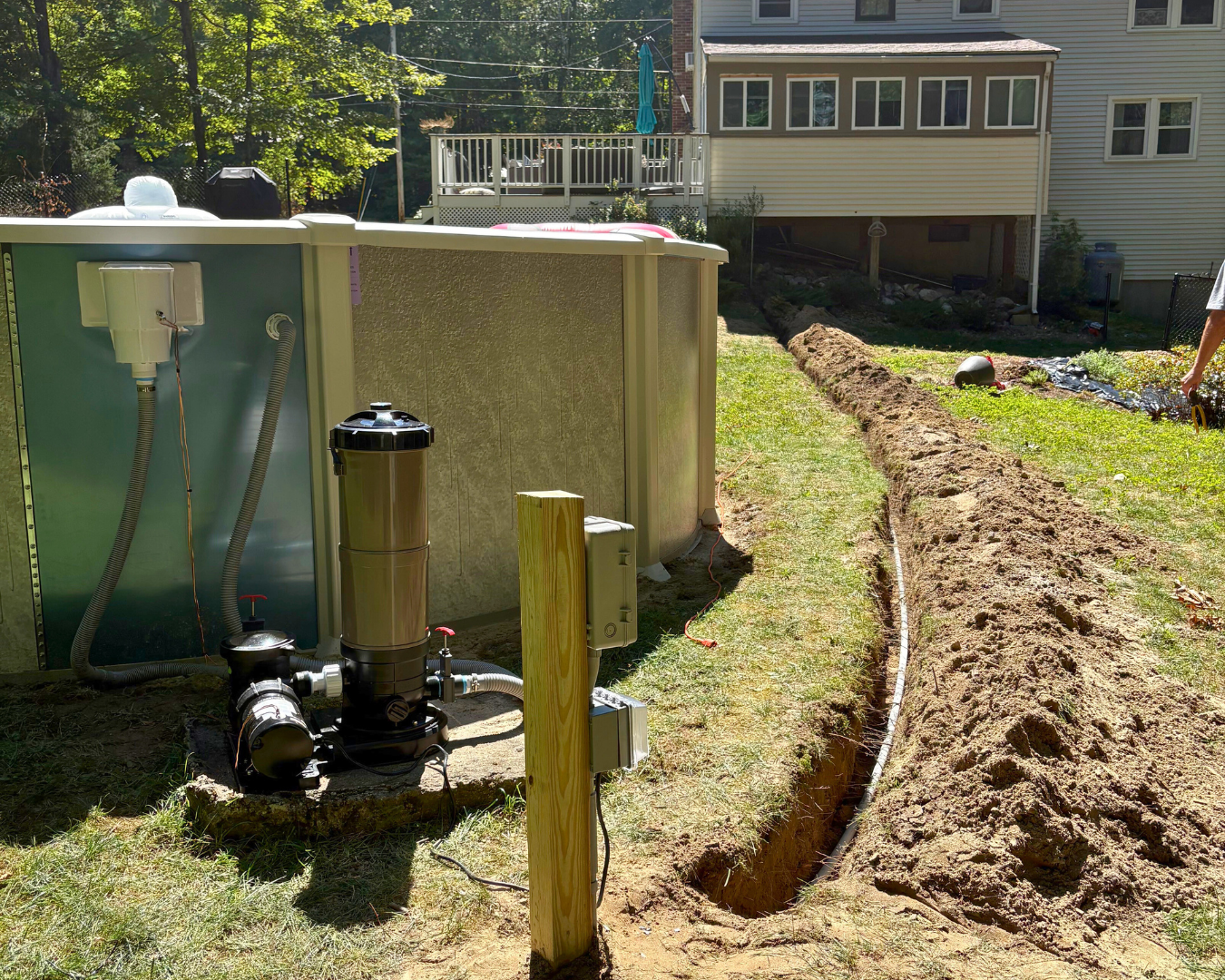 Residential pool electrical wiring installation with trenching and pump wiring by Hewson Electric — pool and hot tub electrician serving southern NH
