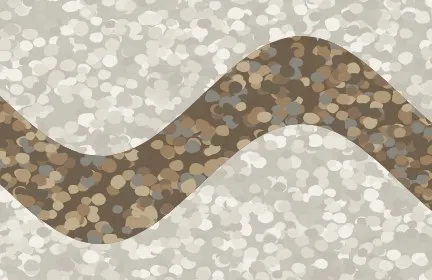 A curving band of brown stone through a light stone surface