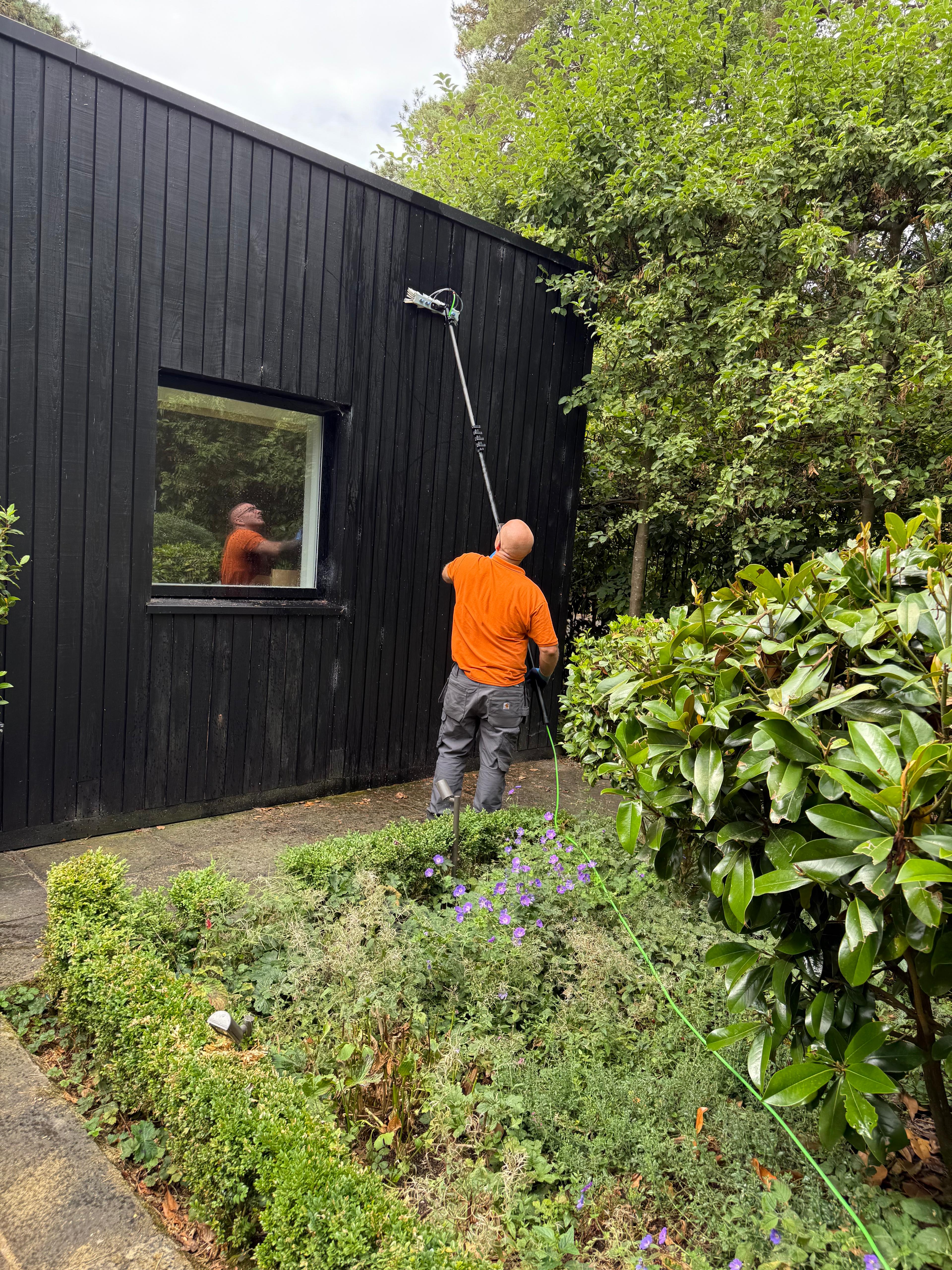 Timber black cladding cleaning