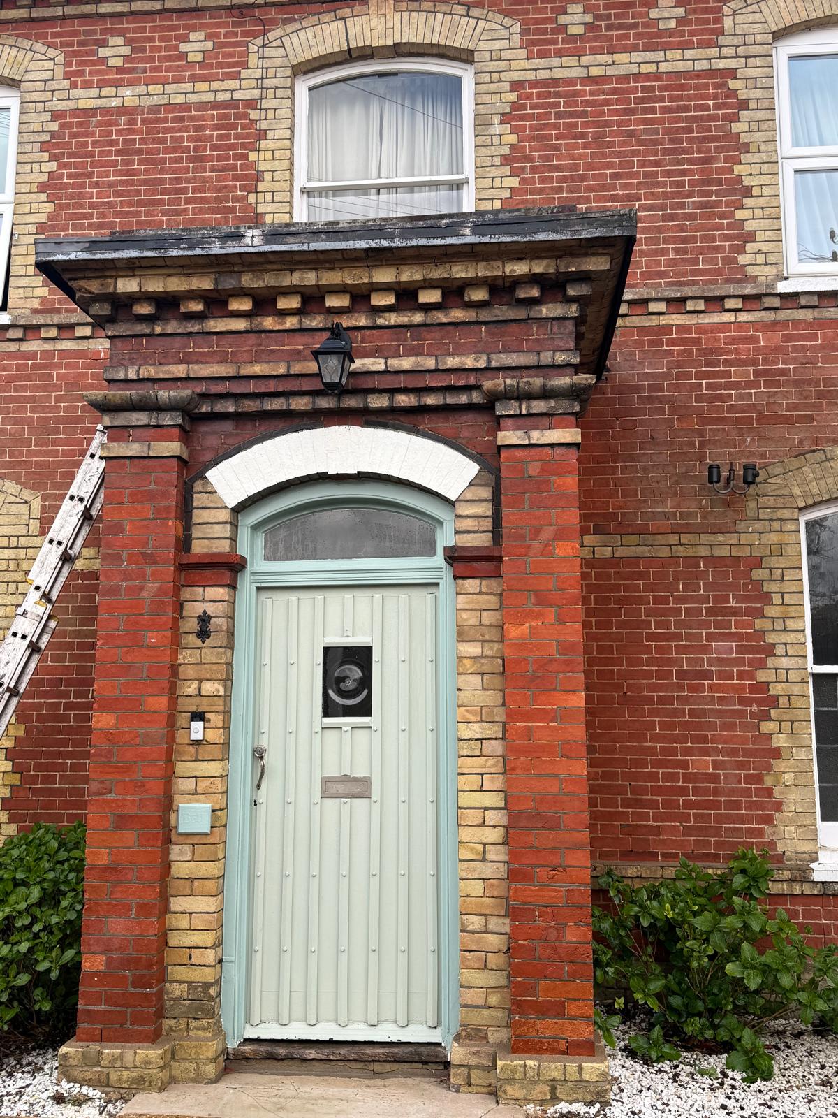 Heritage brickwork before cleaning with carbon and pollution staining