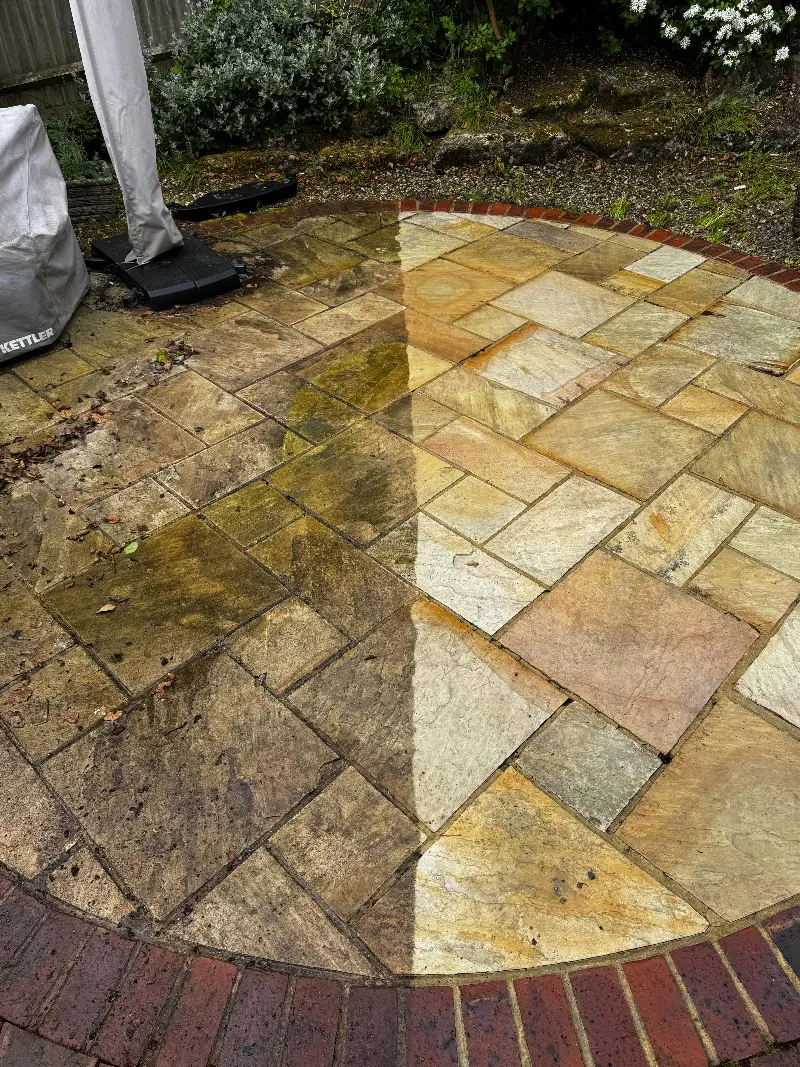Block paving patio after cleaning and re-sanding