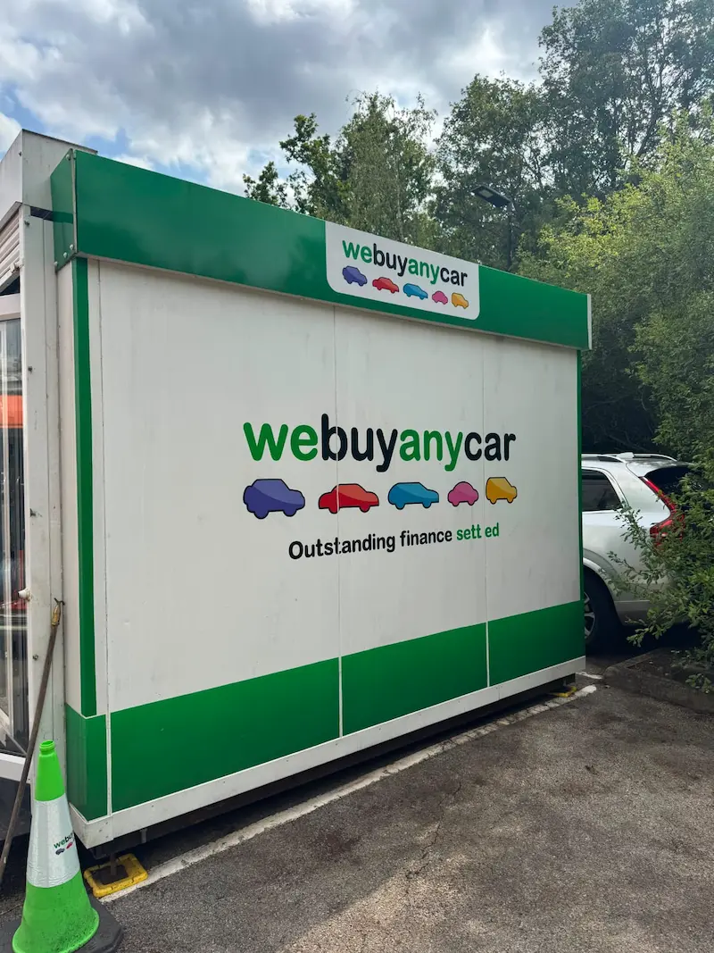 Pressure washing the parking bay during commercial cleaning in Leatherhead