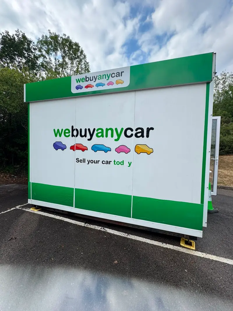 Pressure washing the parking bay at the webuyanycar Leatherhead site