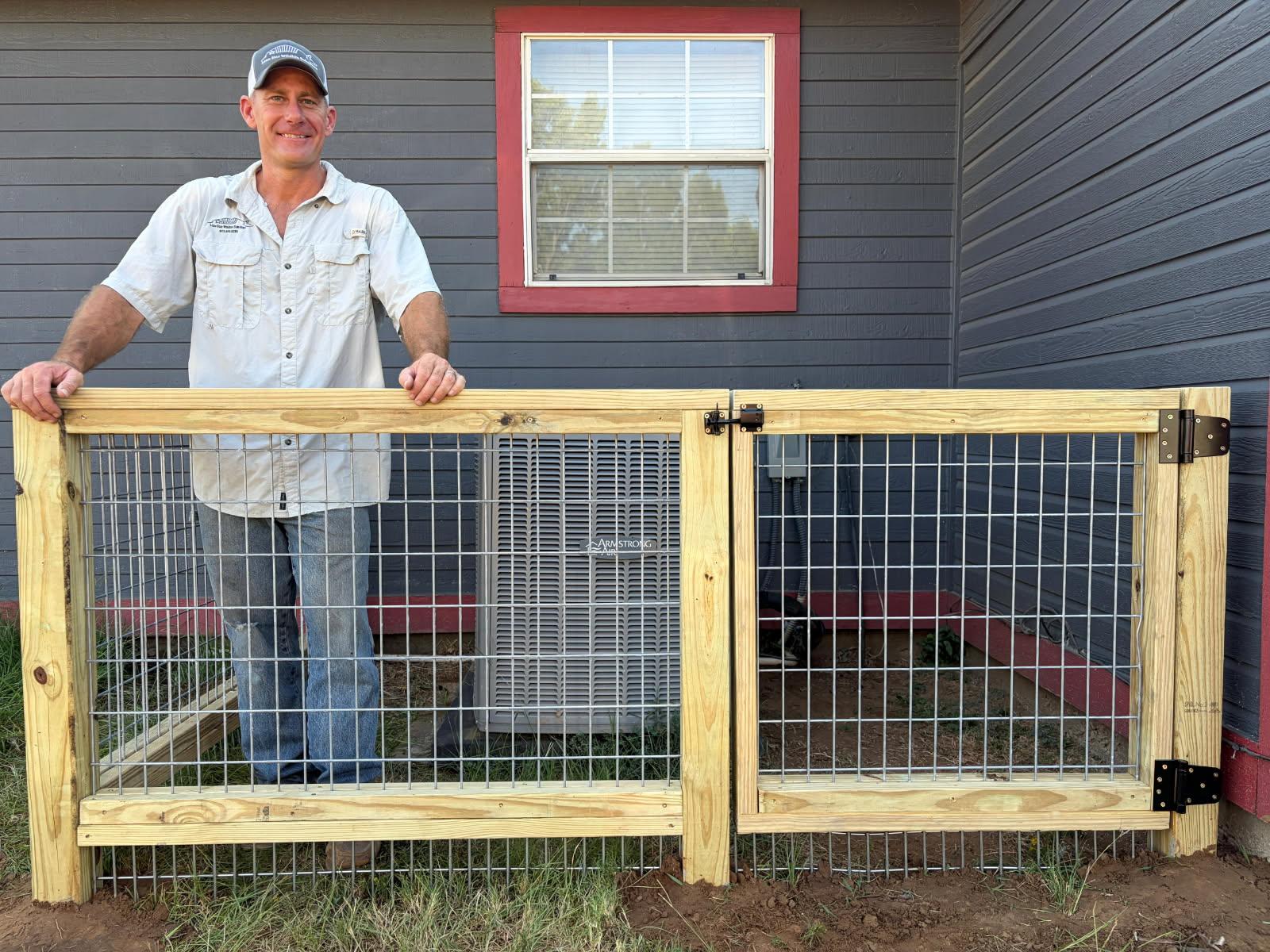 Exclusion fence installed around outdoor A/C unit to keep armadillos from digging and tearing up the area around the homeowner's air conditioner
