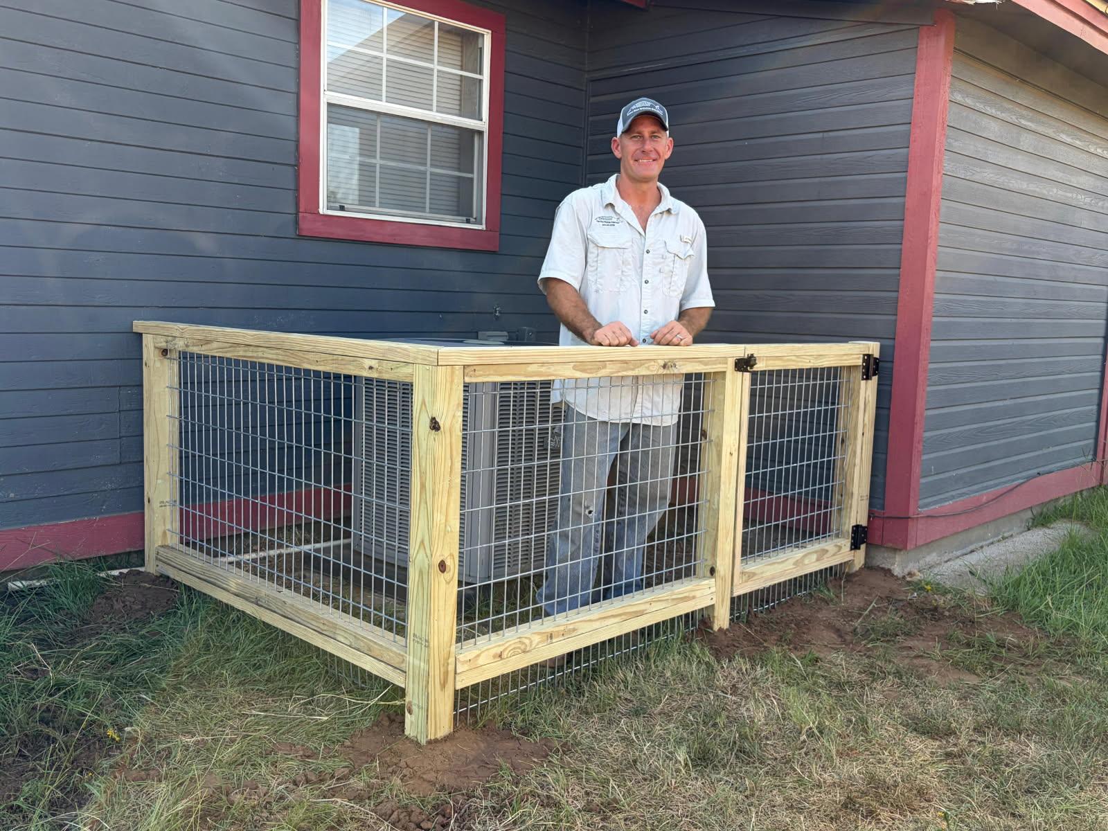 Exclusion fence installed around outdoor A/C unit to keep armadillos from digging and tearing up the area around the homeowner's air conditioner