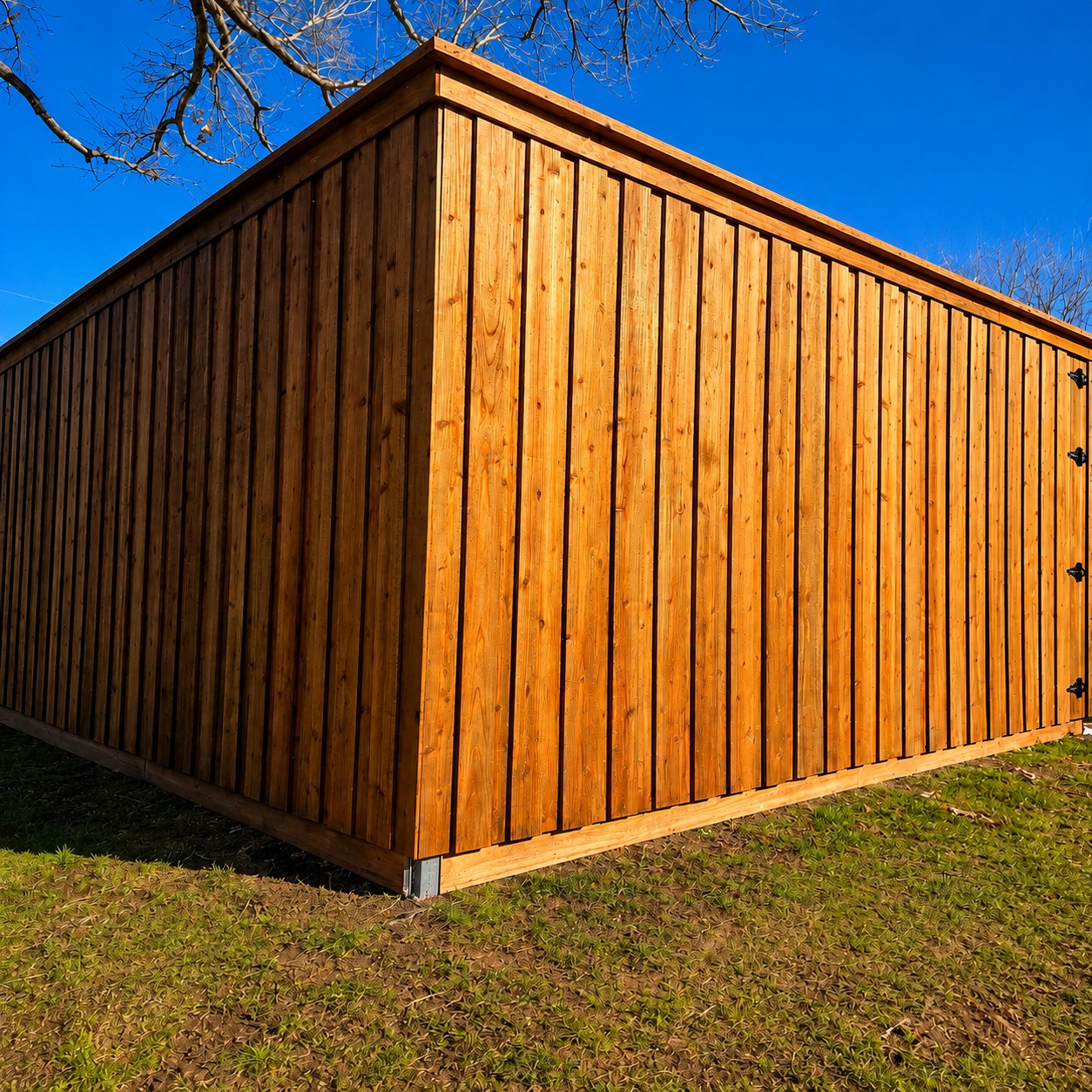 Cedar privacy fence beside a landscaped yard