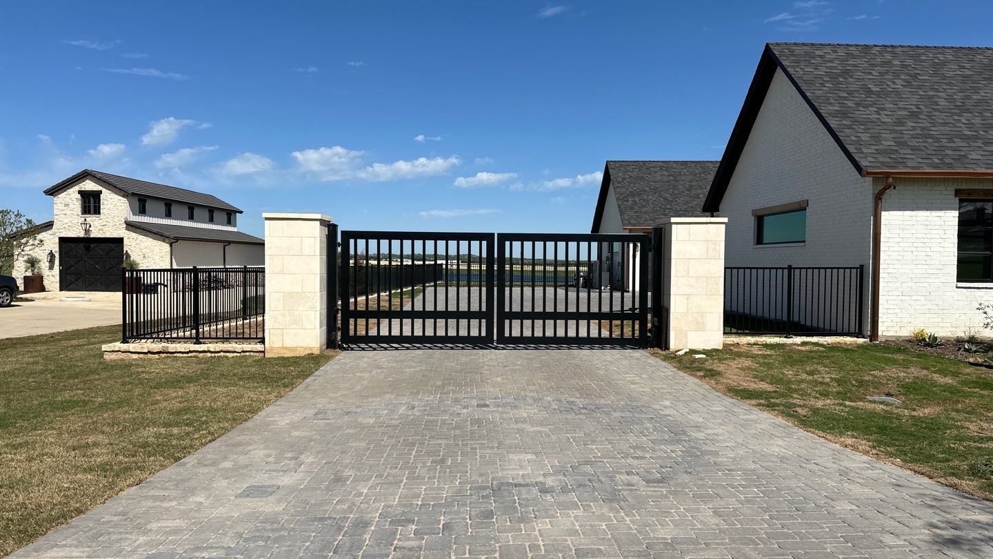 Automatic drive gate installed by Make Me A Fence in Aledo, TX