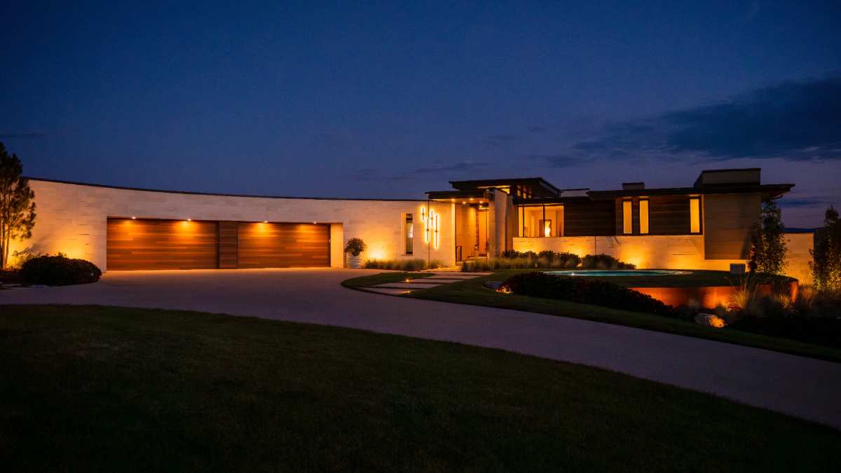 Home and landscape lit at night