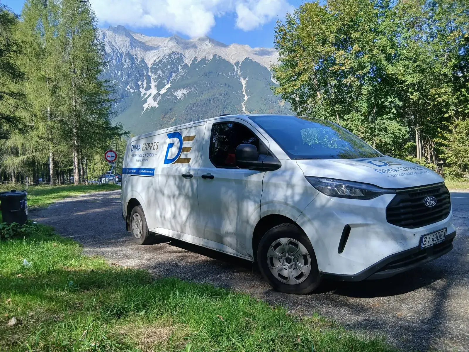 Dima Expres van parked in the mountains