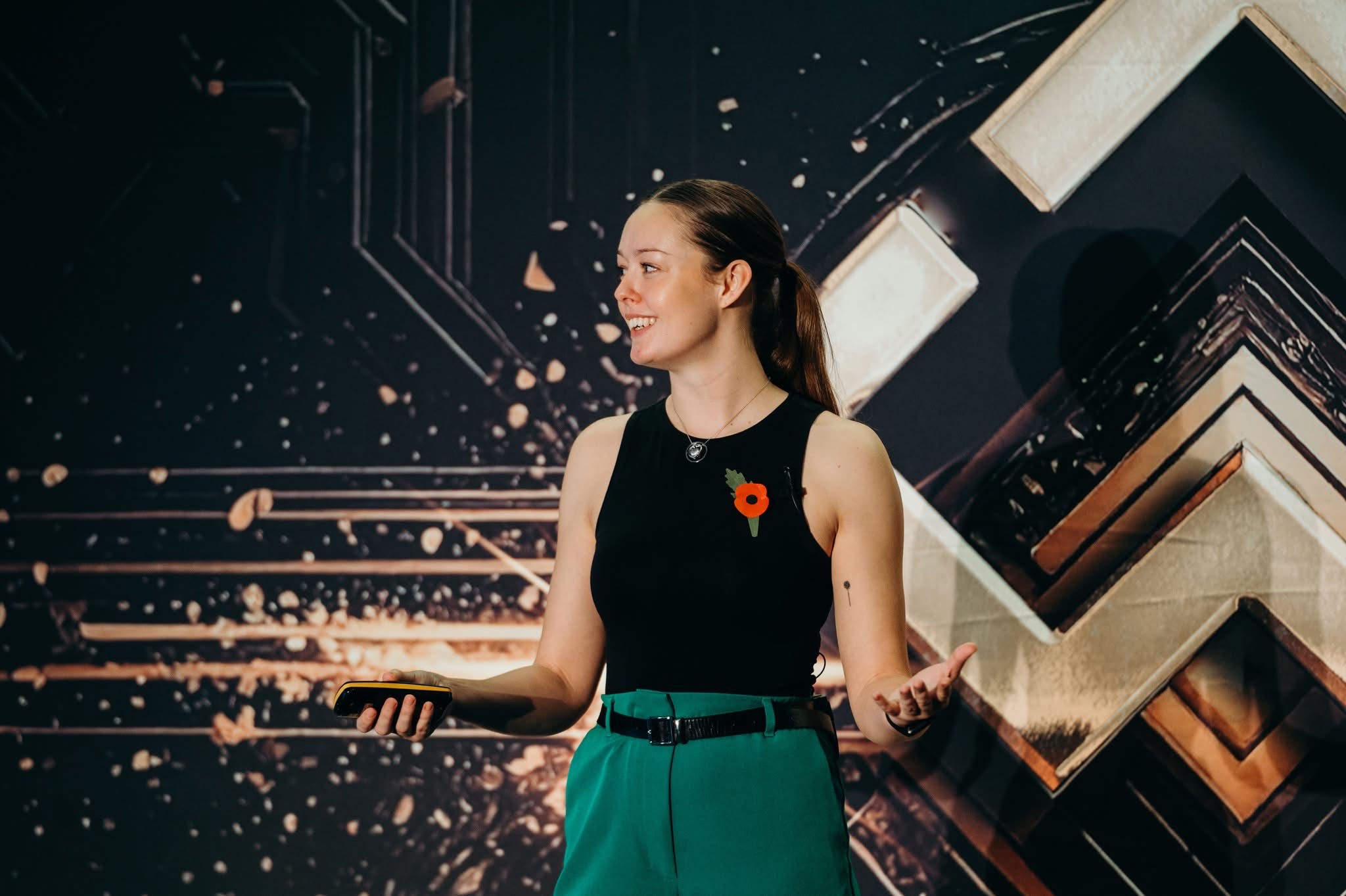 Katie Harvey presenting on stage