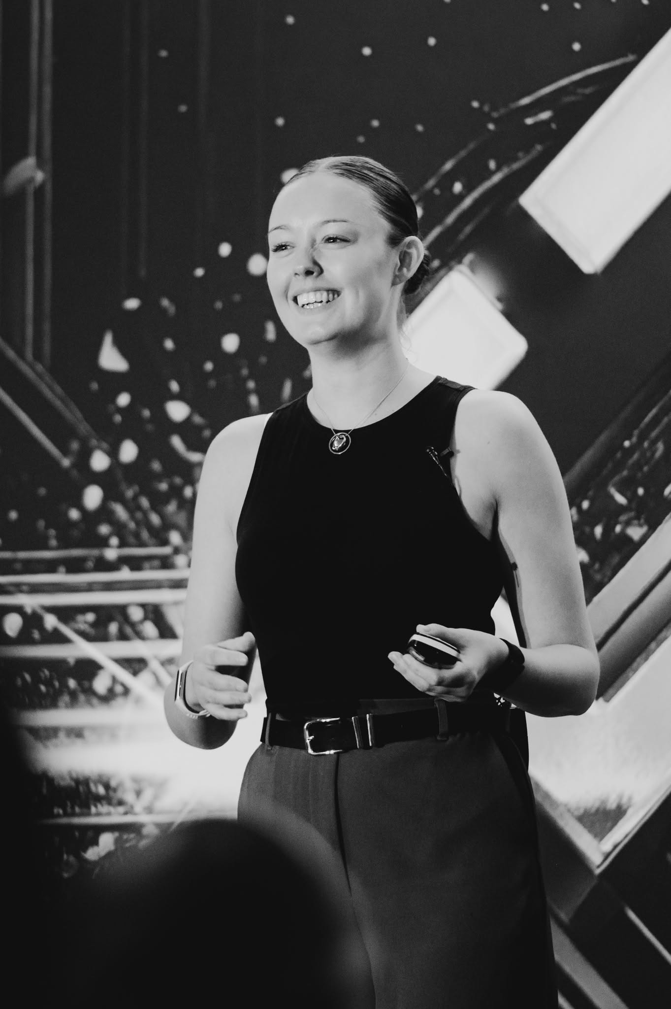 Katie Harvey delivering a keynote to an audience
