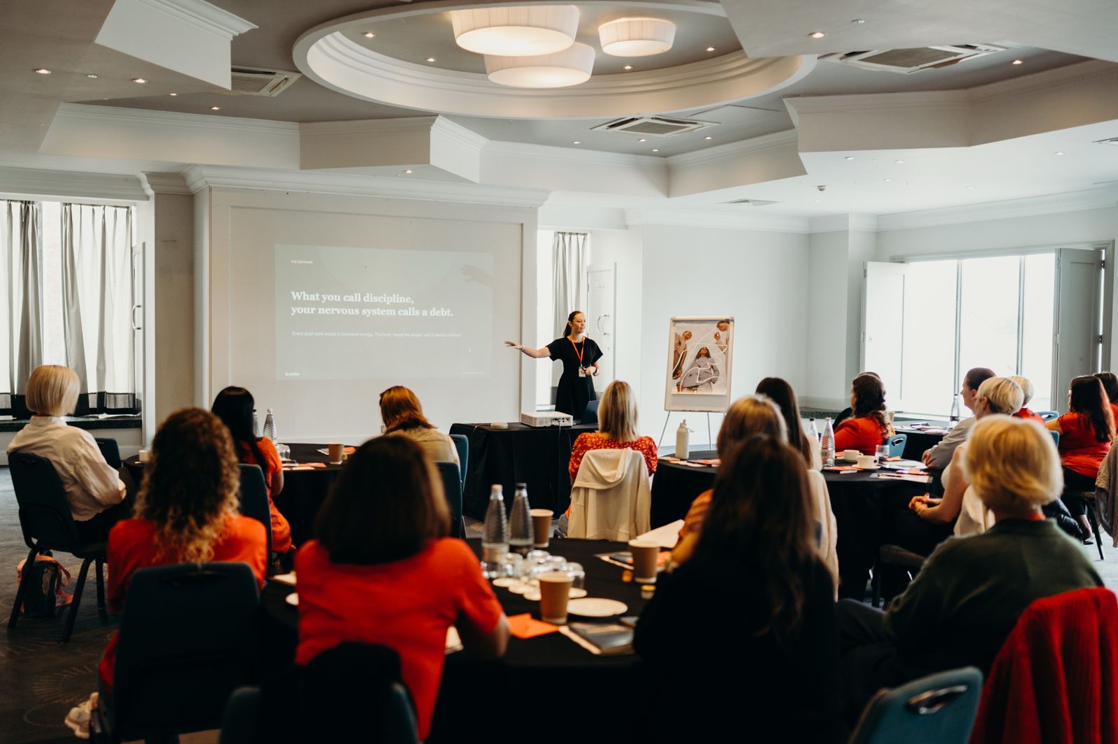 Katie Harvey delivering a keynote