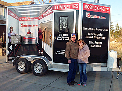John Cales and Mary Kline with their trailer
