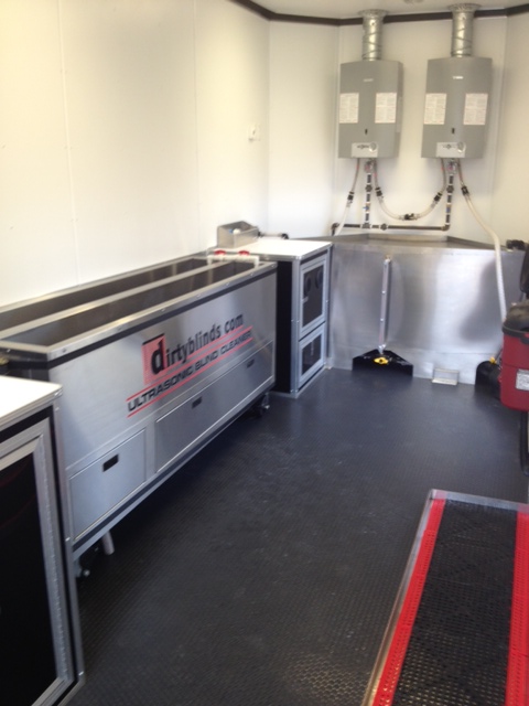 Interior of a DirtyBlinds.com mobile cleaning trailer
