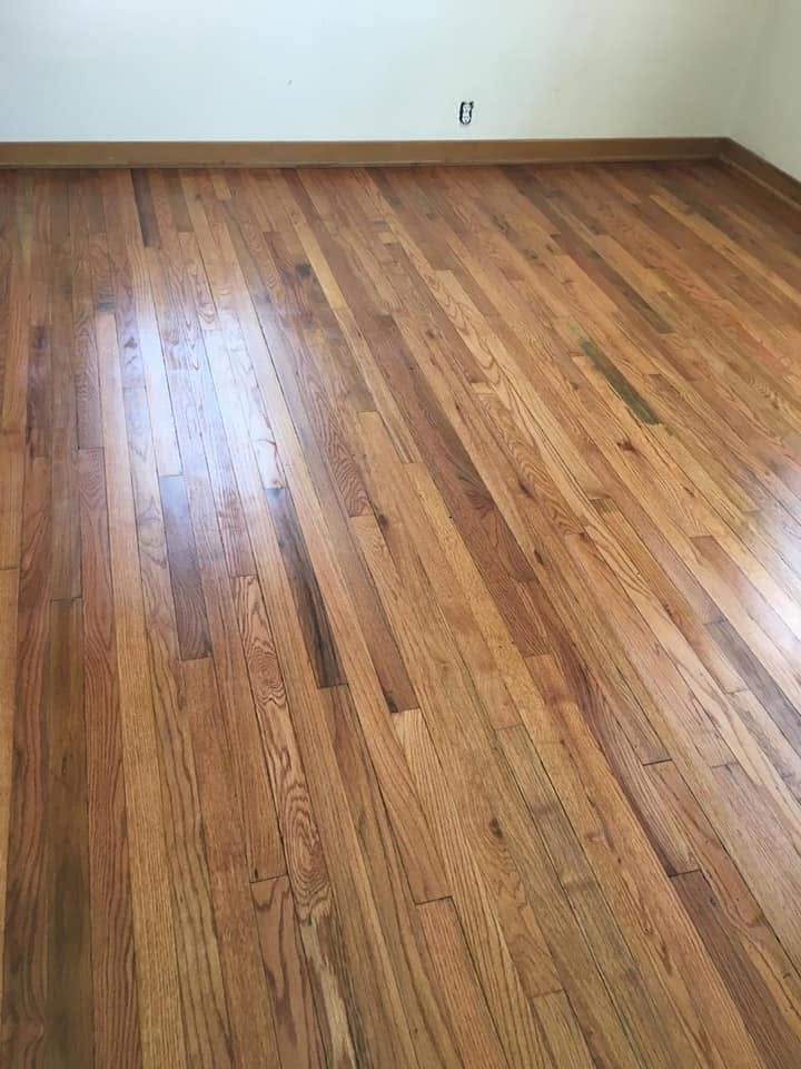 Hardwood floor finishing project by Heritage Paint Works