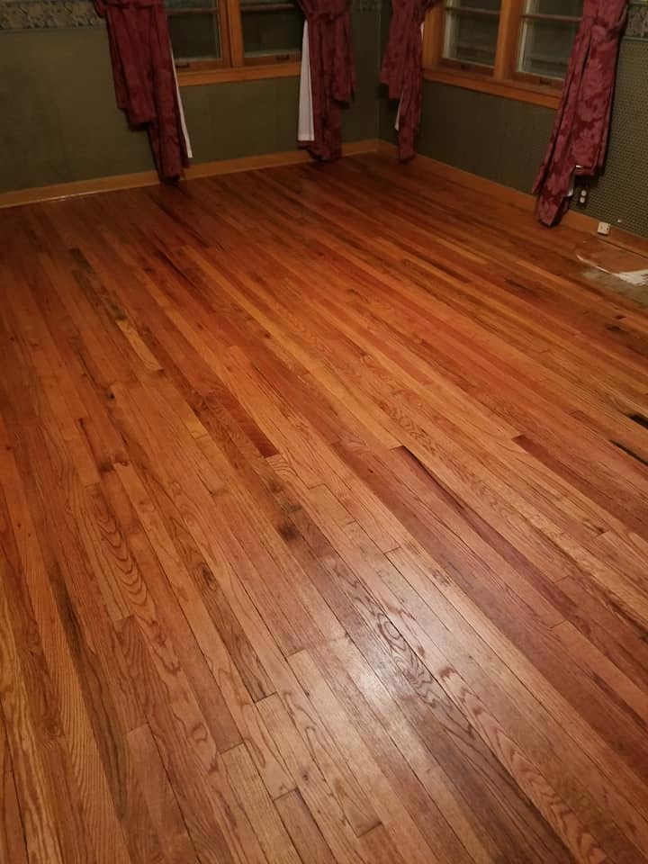 Wood floor refinishing by Heritage Paint Works