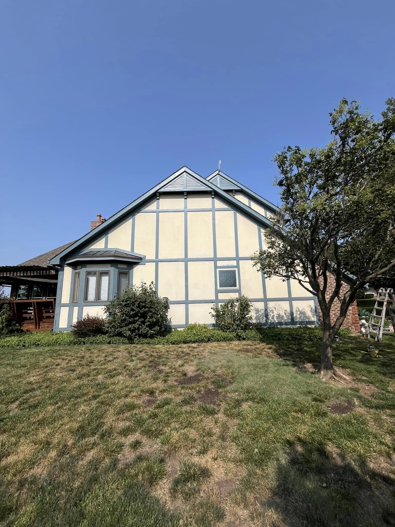 Exterior siding painting by Heritage Paint Works