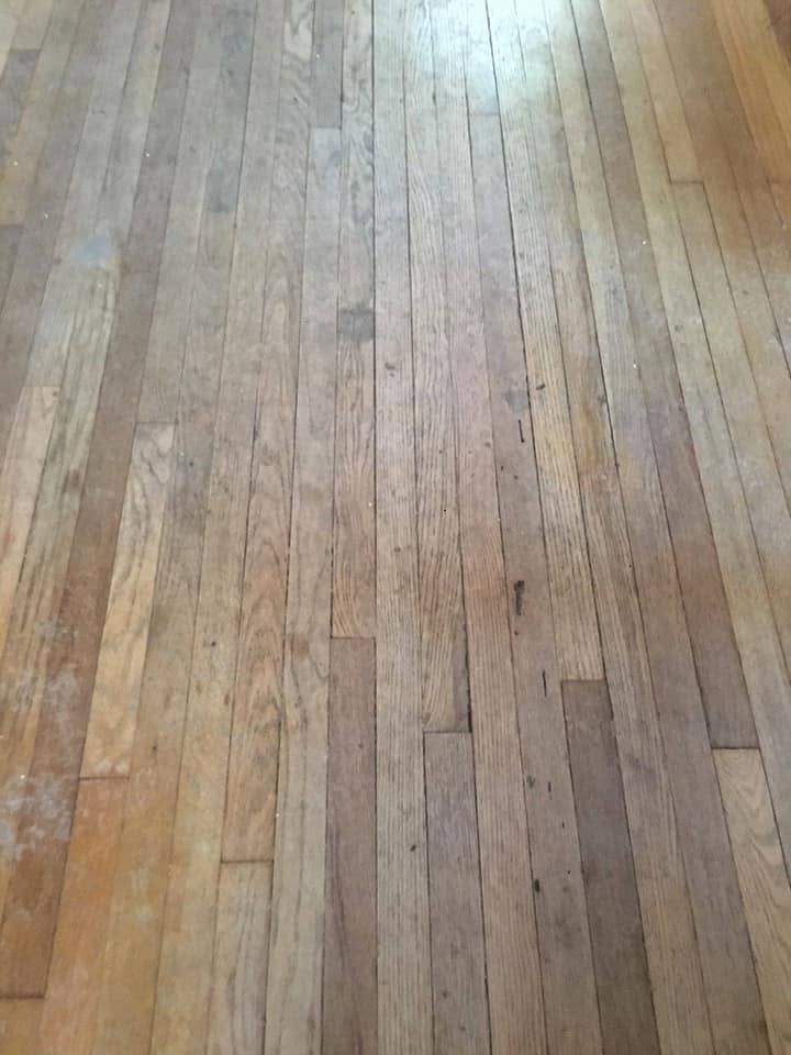 Hardwood floor refinishing by Heritage Paint Works