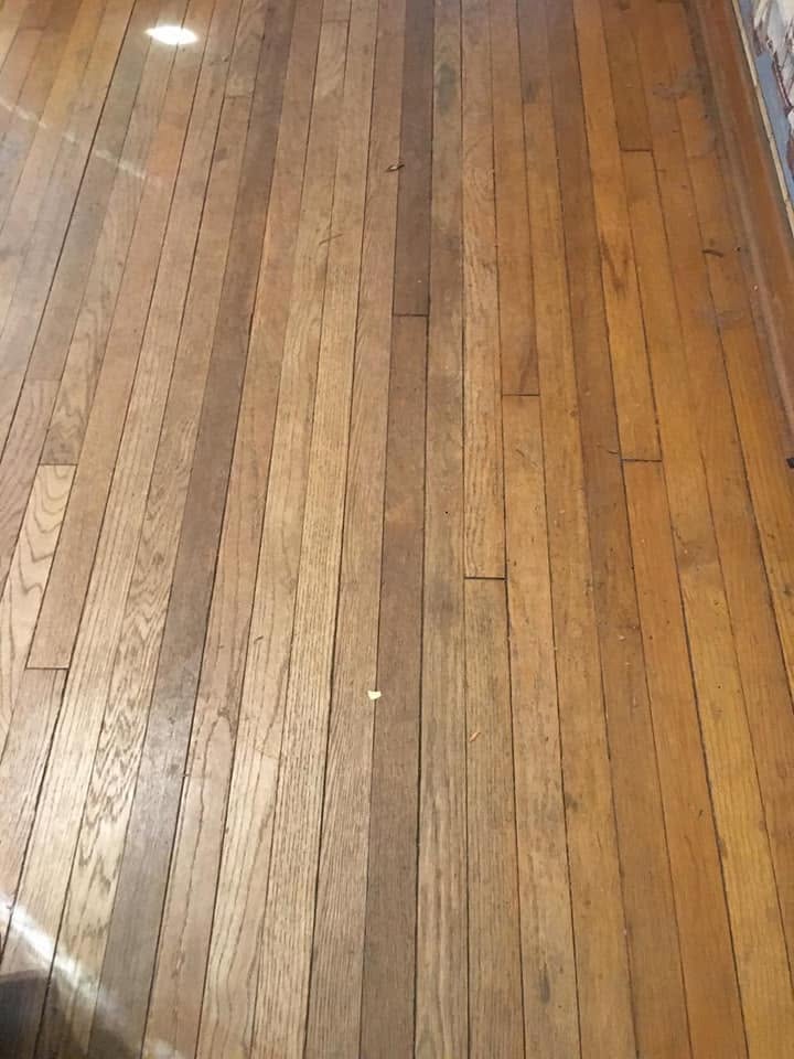 Hardwood floor refinishing by Heritage Paint Works