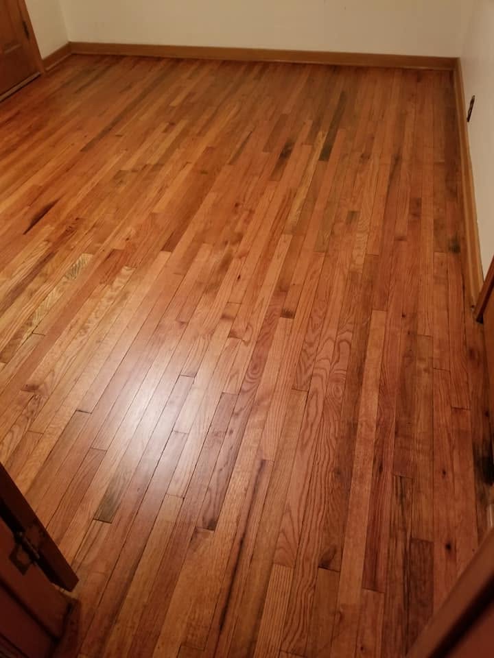 Hardwood floor sanding and sealing by Heritage Paint Works