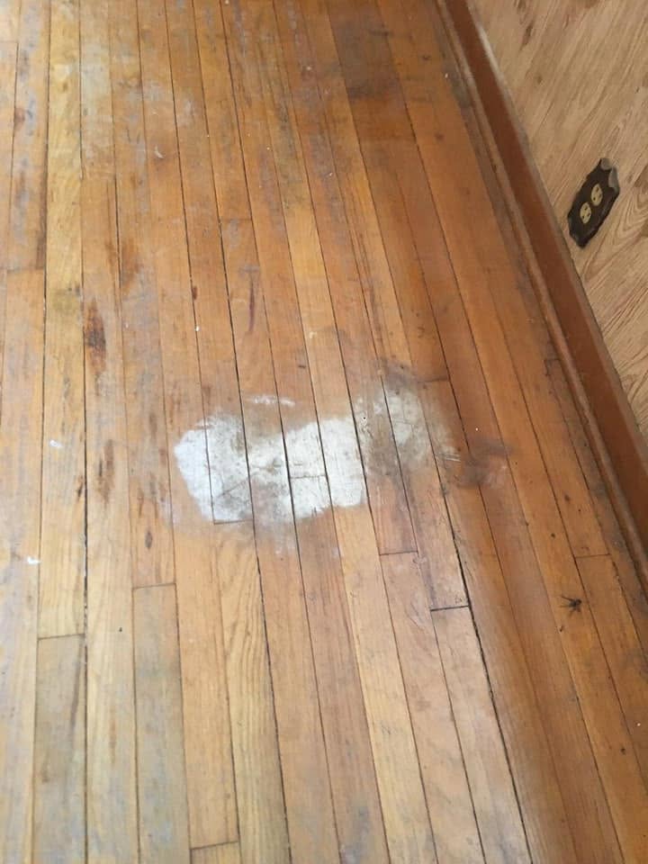 Hardwood floor restoration by Heritage Paint Works